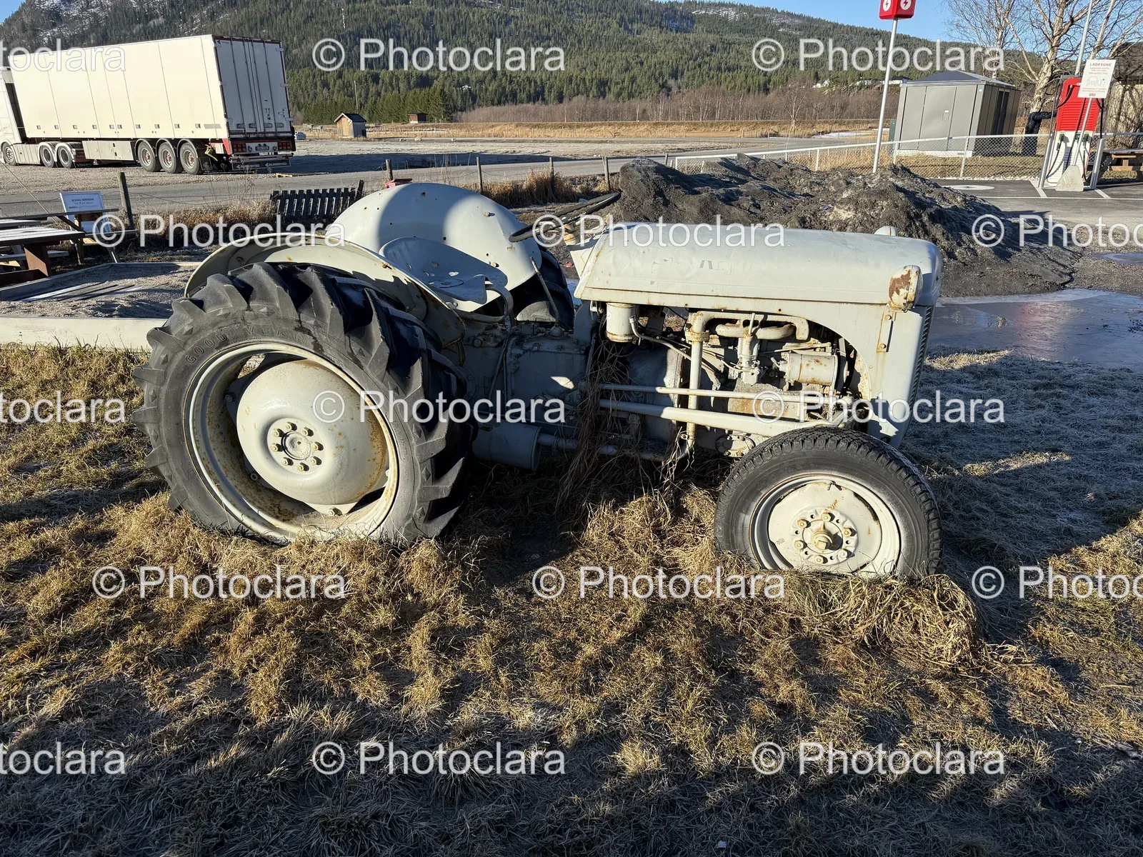 Tractor-in-a-Field-of-Grass.jpg