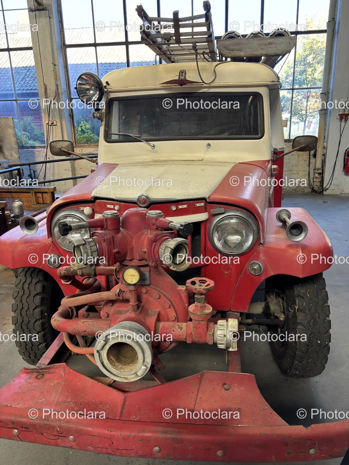 red-white-vehicle-in-garage.jpg