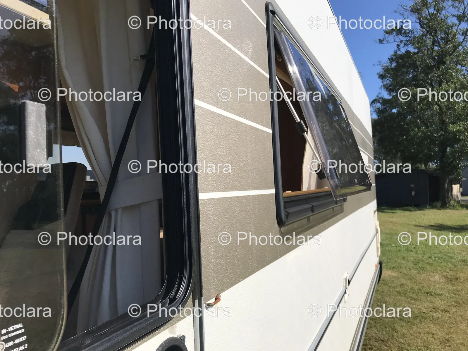 camper-van-with-open-window-in-nature.jpg