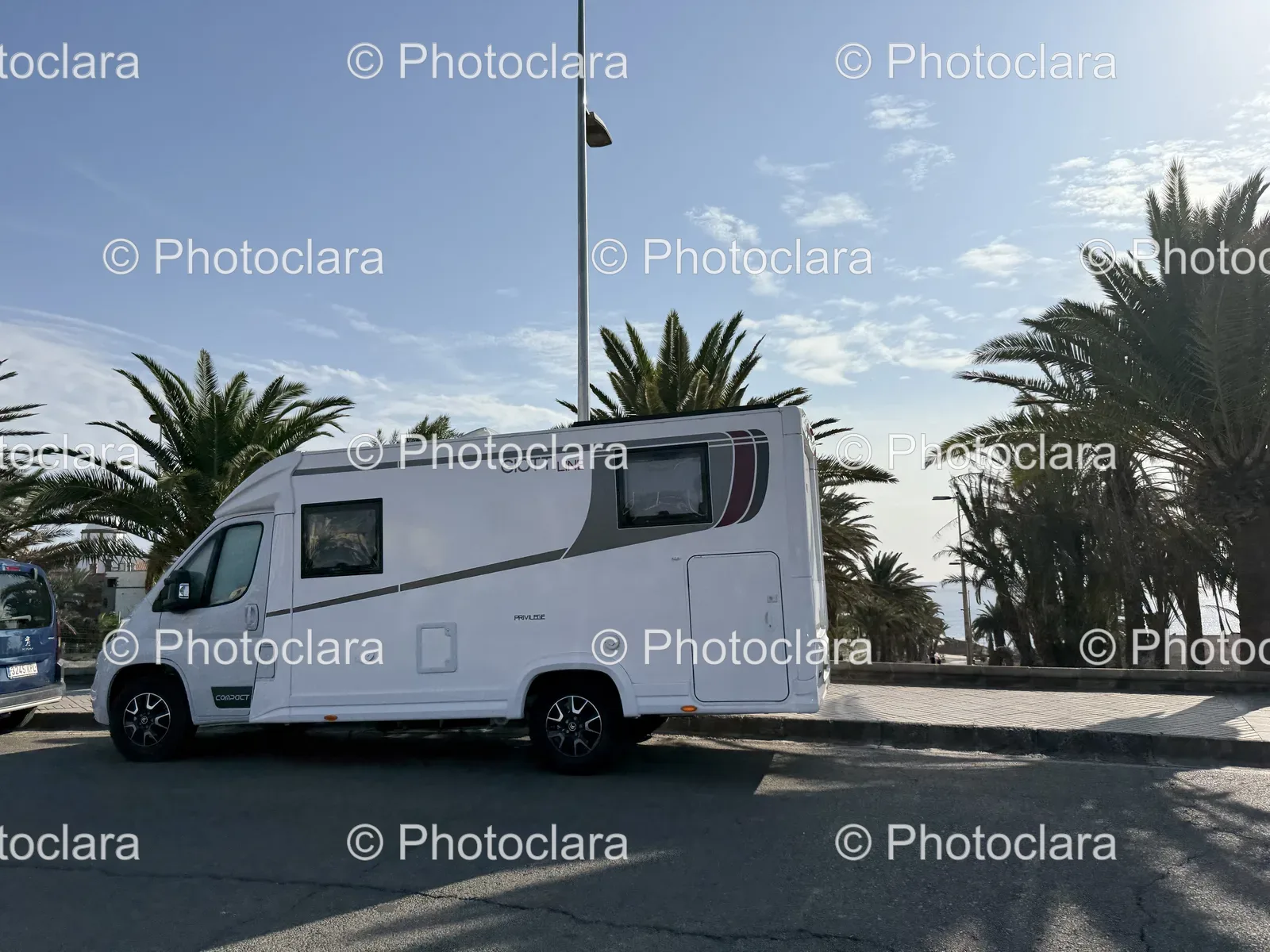 Parked-White-RV-on-Road.jpg