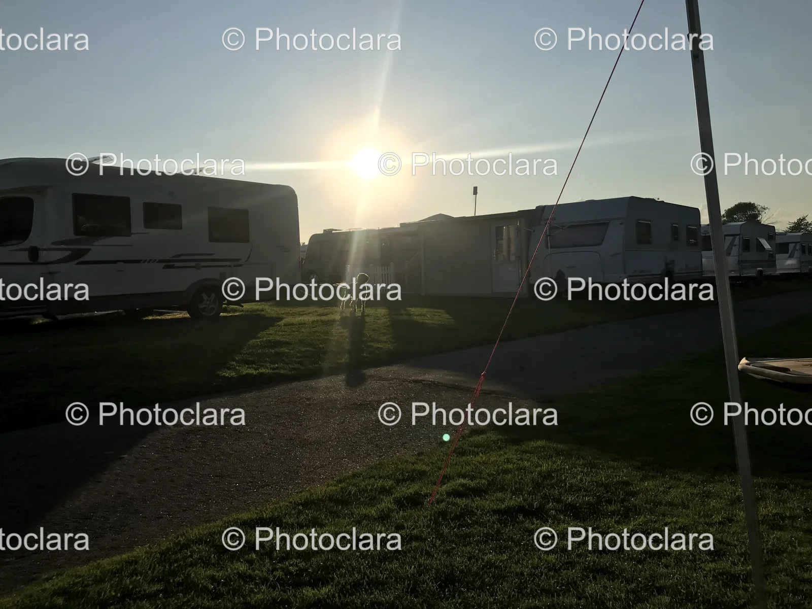 RVs-Parked-Sunset-Lit-Parking-Lot.jpg