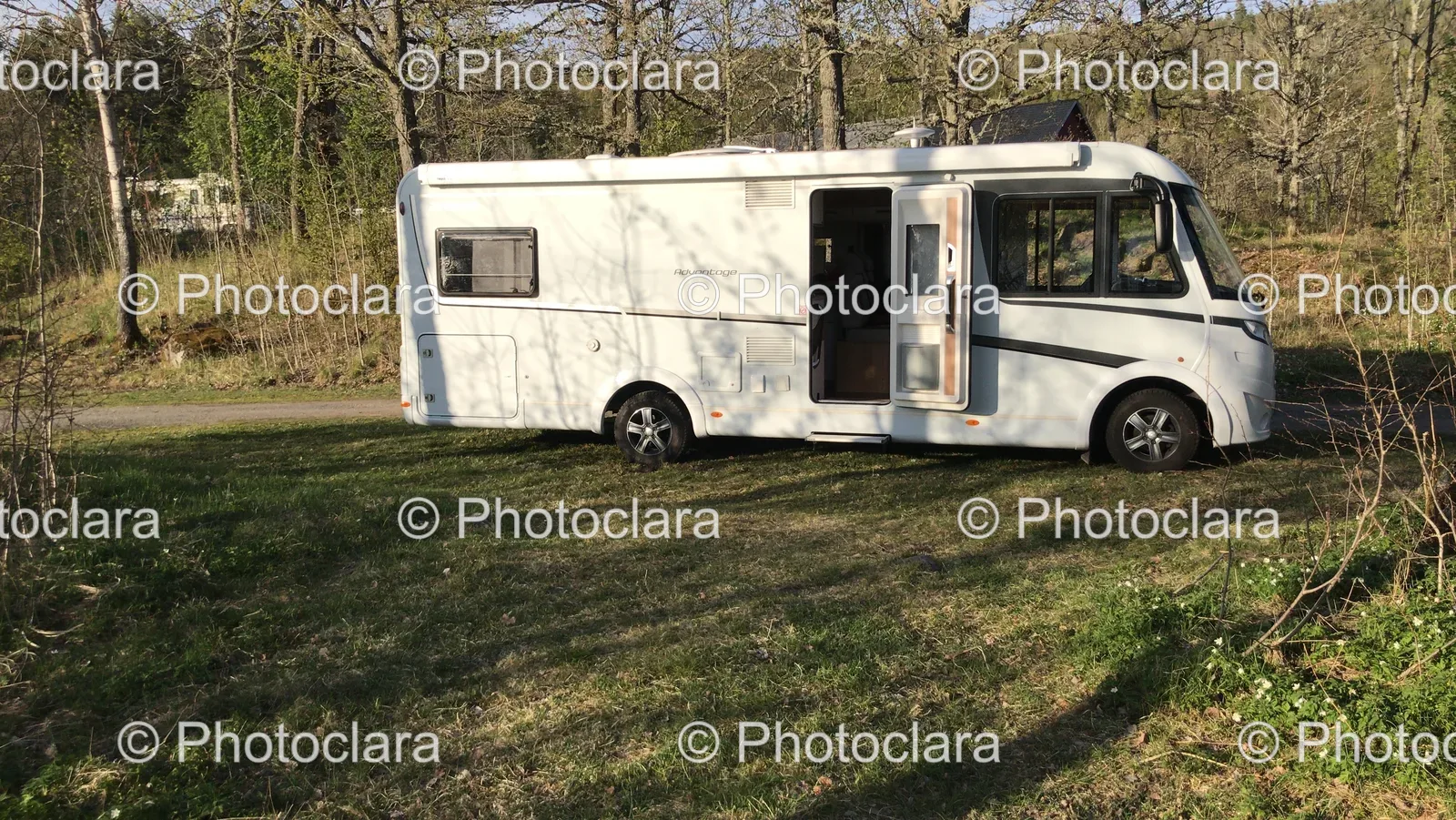 white-rv-parked-in-grassy-area.jpg