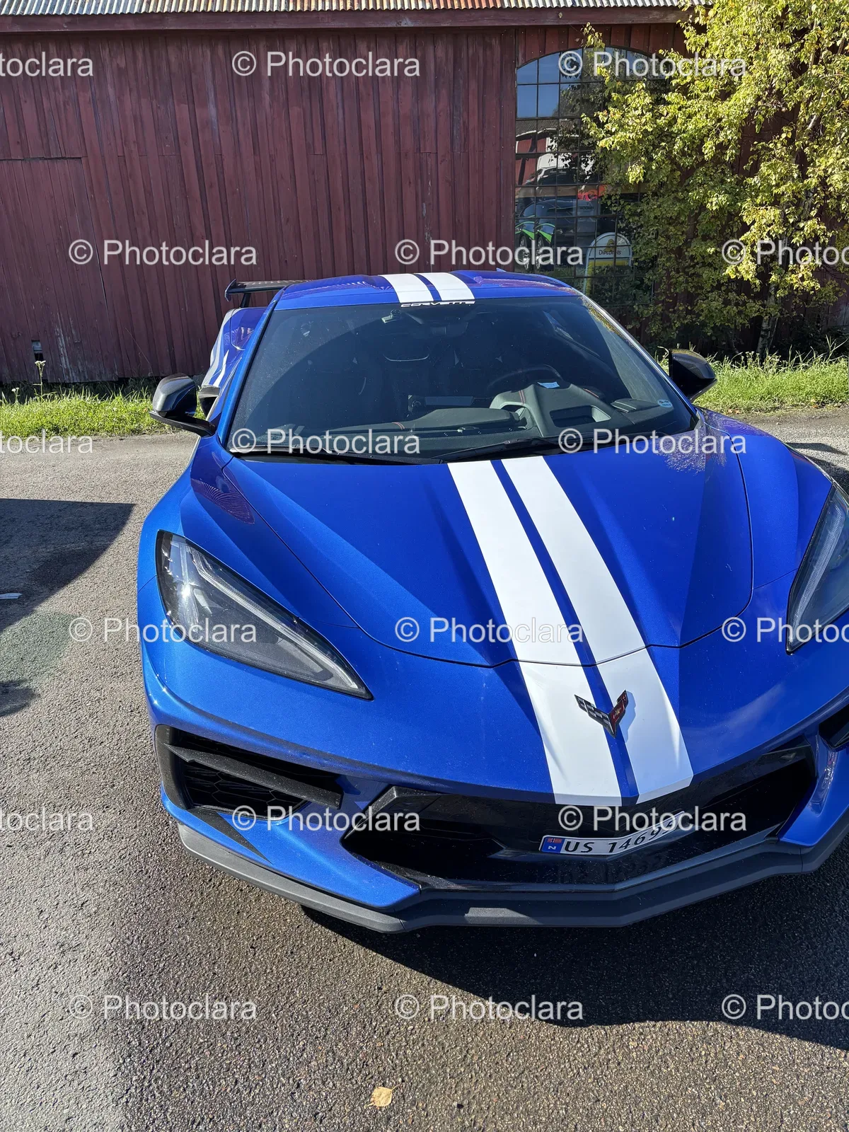 Blue-Sports-Car-with-White-Stripes.jpg