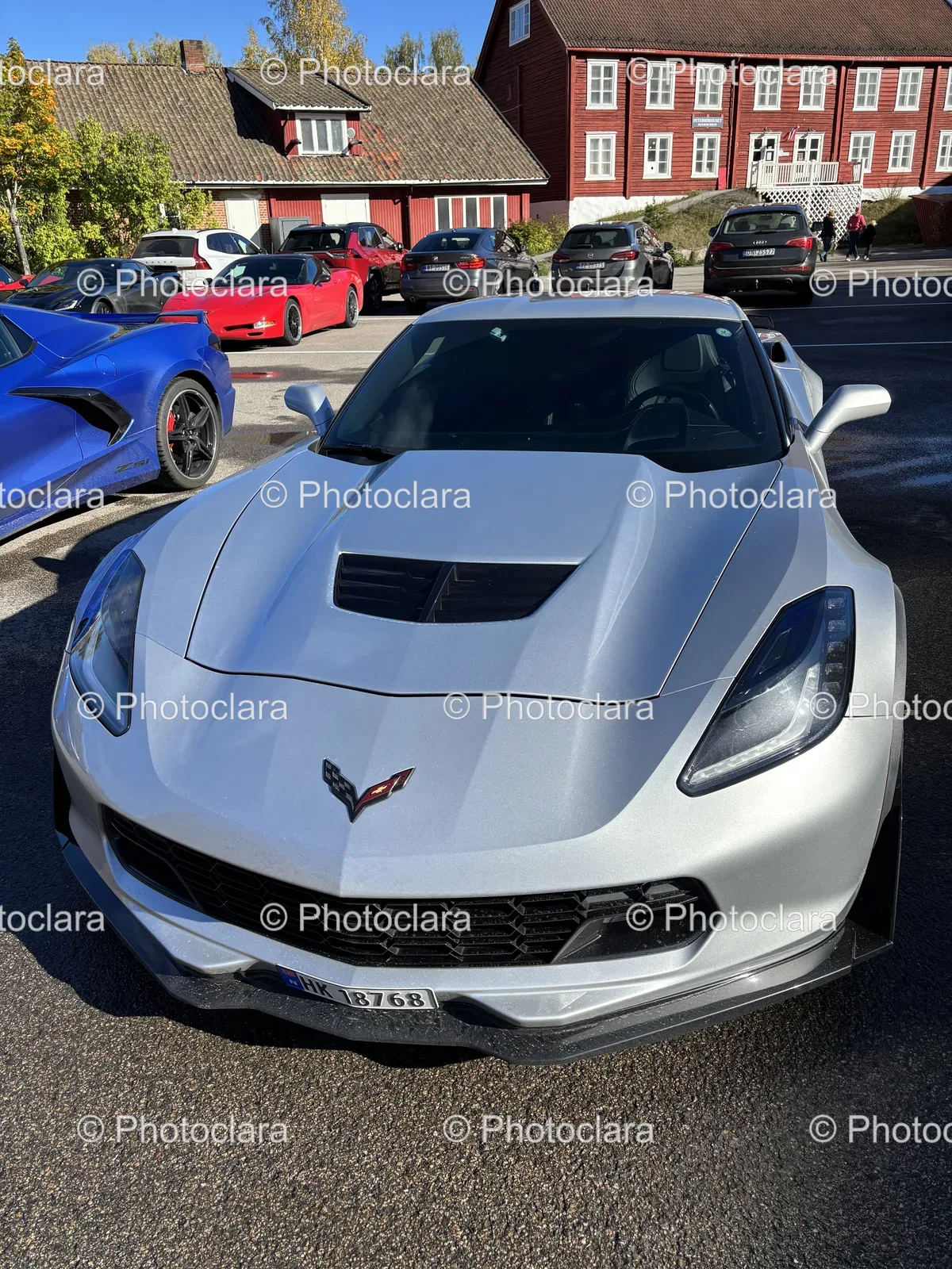 Silver-Sports-Car-Parked-in-Parking-Lot.jpg