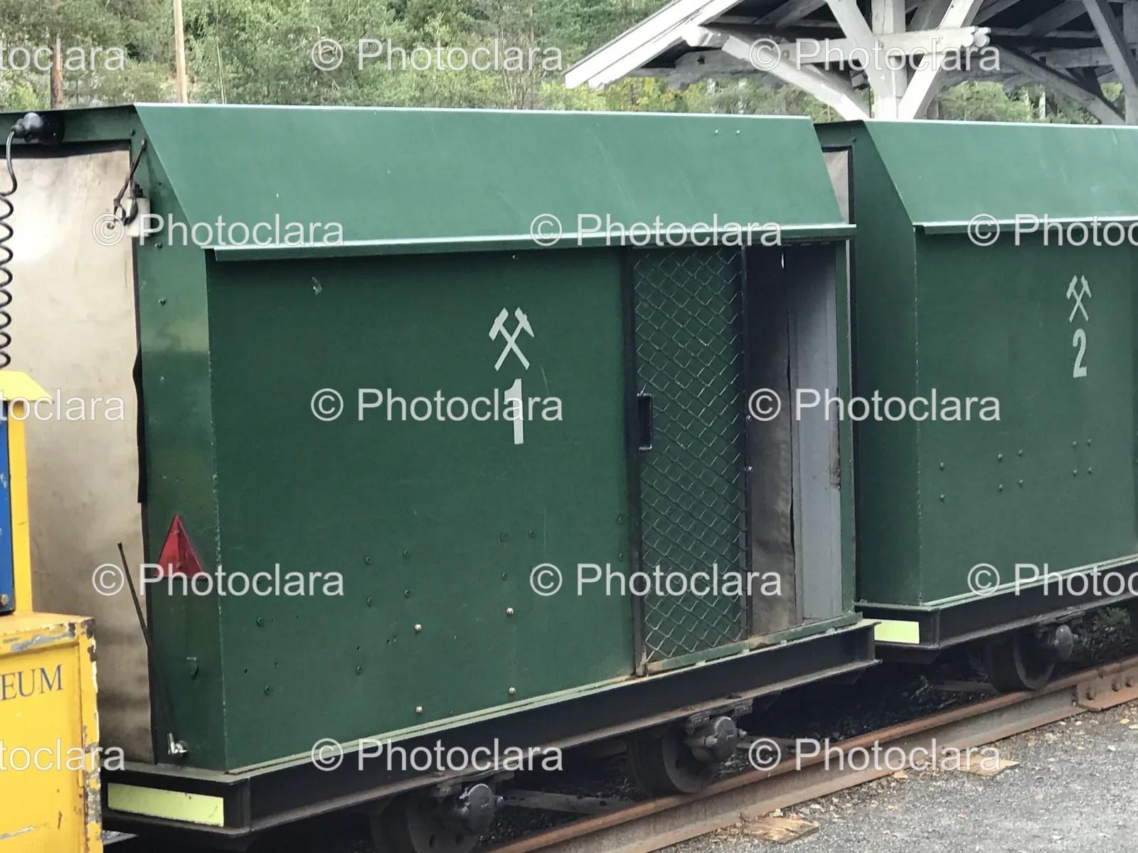 Green-Train-Car-on-Tracks.jpg