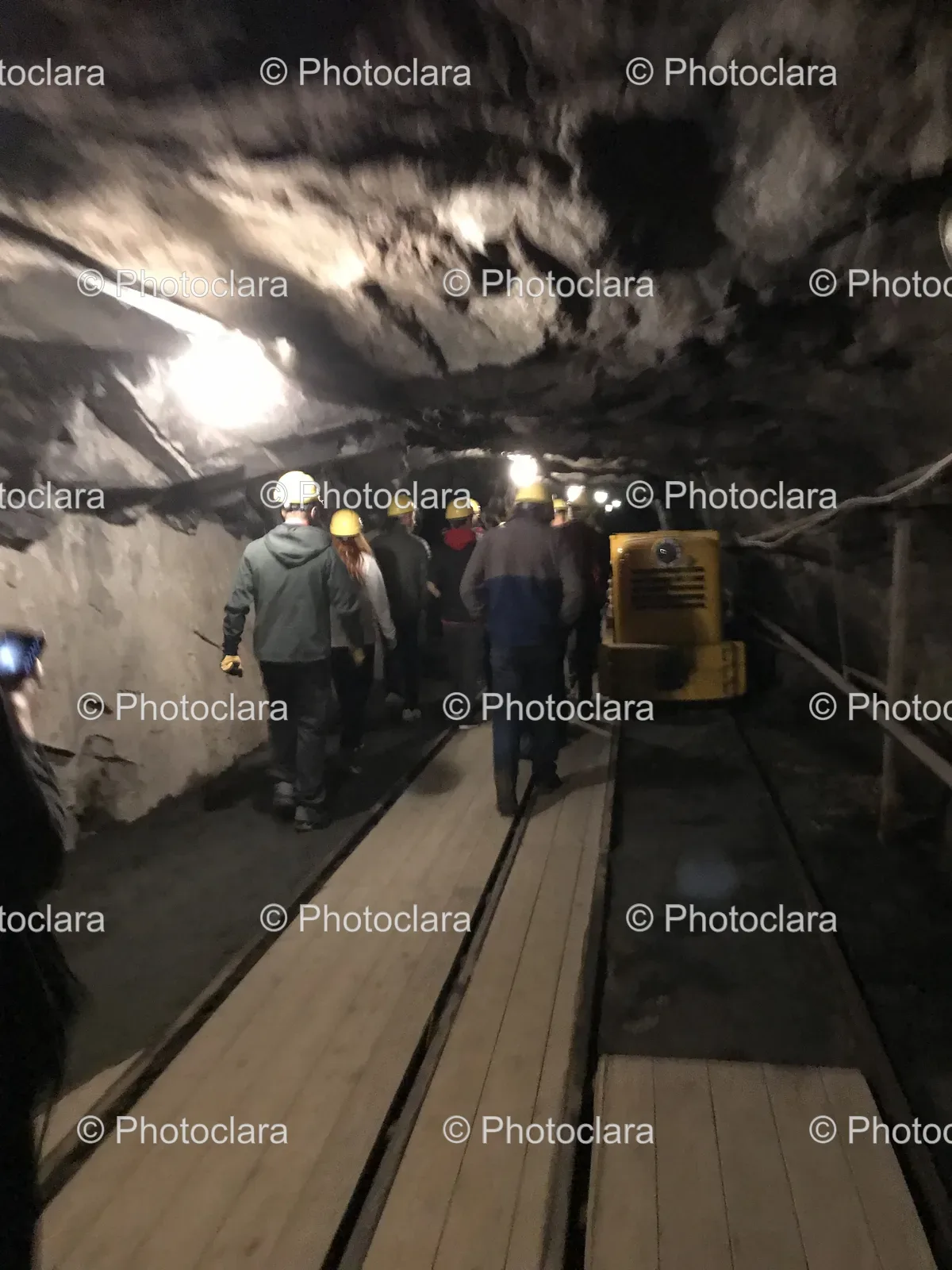 group-of-people-in-tunnel-near-train.jpg