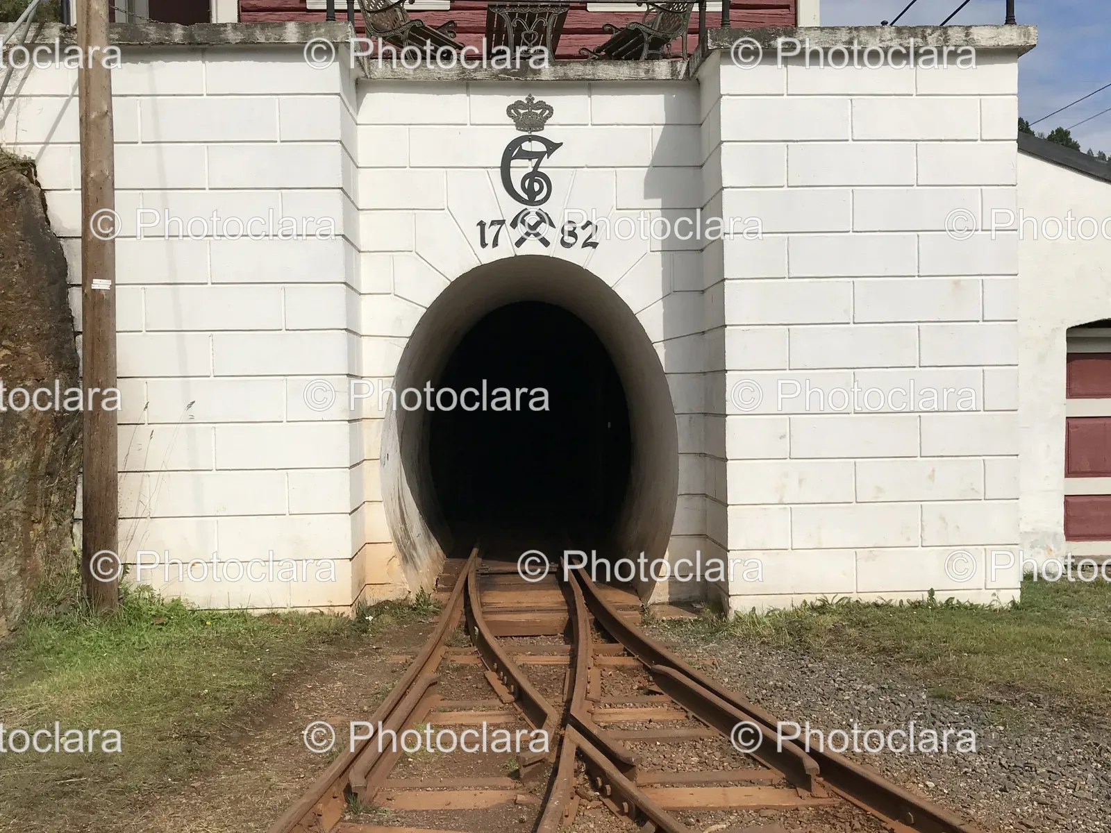 railroad-tracks-leading-into-a-tunnel.jpg