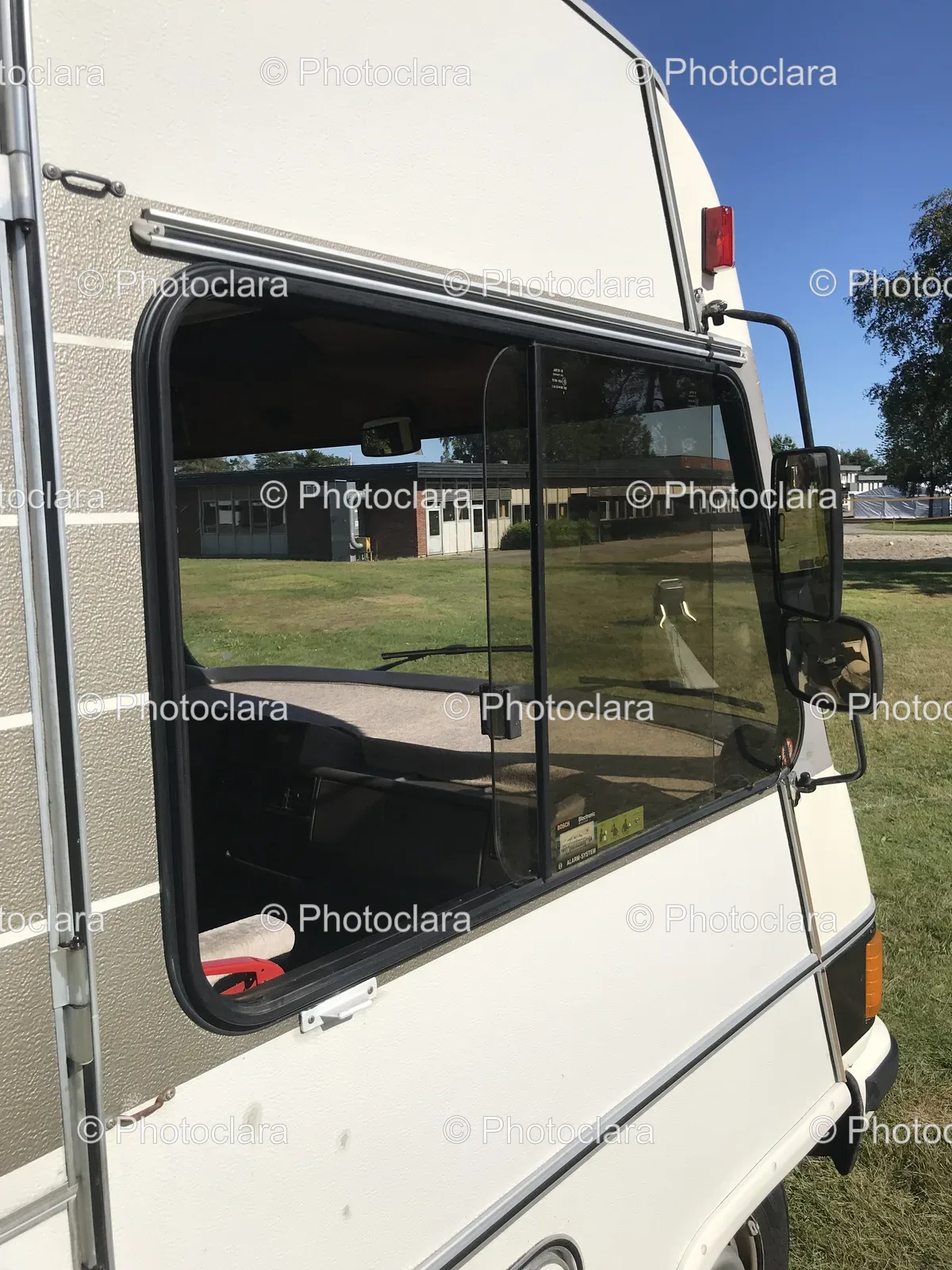 white-van-bloctron-alarm-system-parked-on-grass.jpg